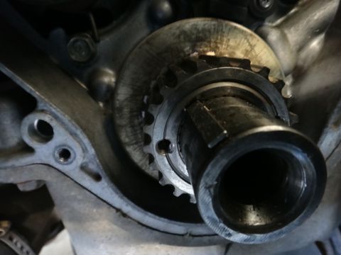 1993 Ford Taurus - This is a close-up view of a mechanical component within an engine, likely a timing gear.