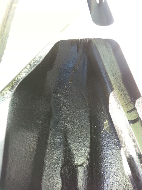 1992 Ford Bronco - this is the trough after I sprayed it again with the flex seal material. this initial application didn't do anything. if you're going to us…