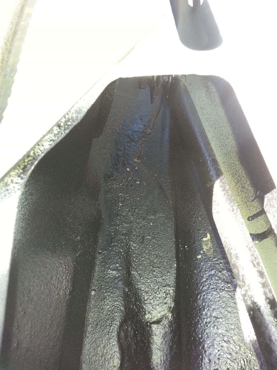 this is the trough after I sprayed it again with the flex seal material. this initial application didn't do anything. if you're going to use the flex seal you'll need to lay it on very heavy.