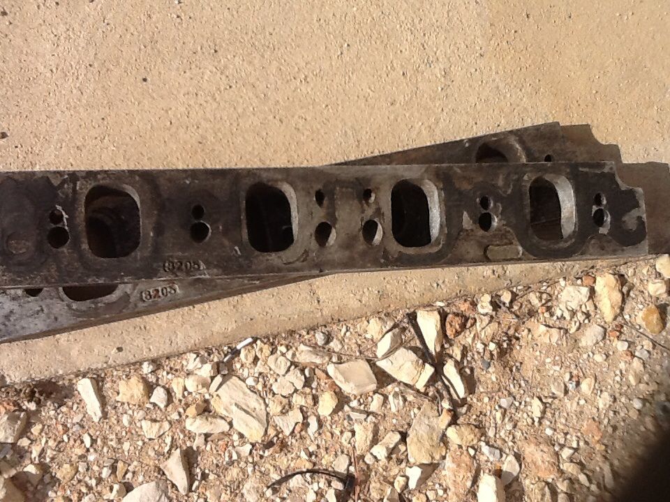 Engine cylinder head with casting numbers 6205 visible