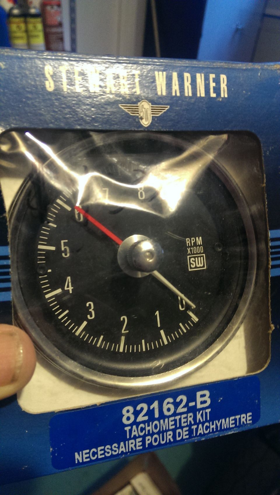 Stewart Warner tachometer gauge with RPM x1000 markings