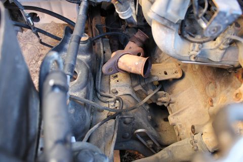 1983 Ford Bronco - To get to this point, I removed: 1) the wheelwell, the fan & shroud, and the belt 2) the alternator & smog pump, 2ndry air pipe along the i…