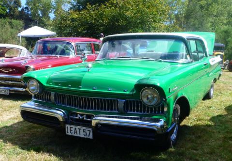 1964 Mercury Monterey - Front view of a green 1957 Mercury Monterey at an outdoor car show.