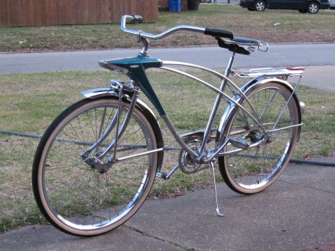 1994 Ford Bronco - This vintage bicycle features a distinctive teal fairing and chrome accents.