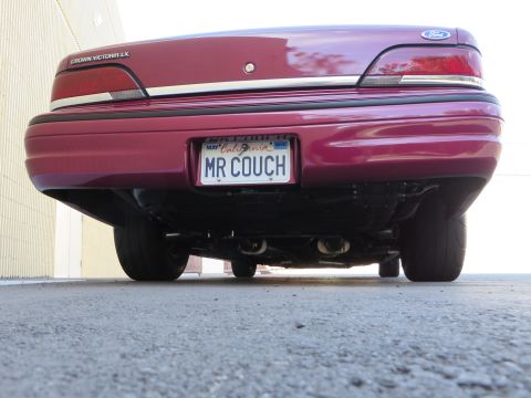 1992 Ford Crown Victoria - The rear end of a 1992 Ford Crown Victoria LX is shown, its taillights and license plate.
