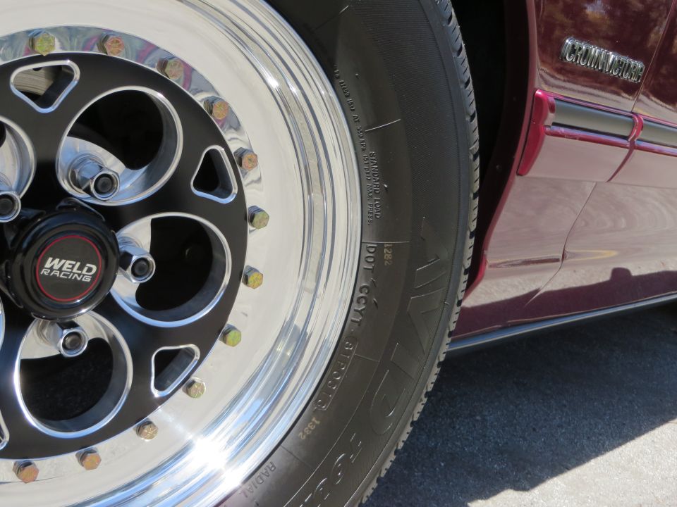 Close-up of a Weld Racing wheel on a 1992 Ford Crown Victoria