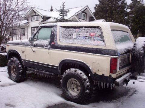 1982 Ford Bronco - Encapsuled in a thick sheet of ice. Need a chisel to get into this.