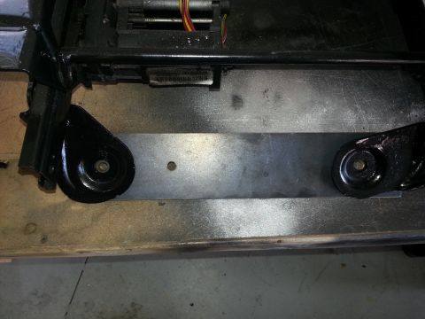 1994 Ford Bronco - Seat mounting bracket with wiring and metal plate visible, likely a replacement part.
