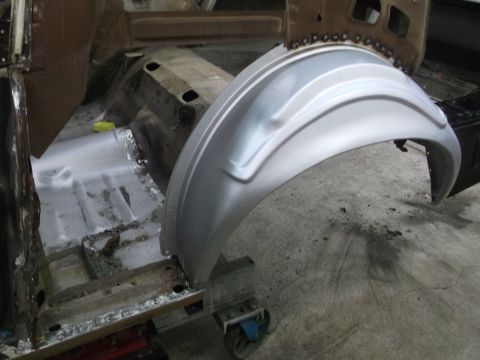 1967 Ford Mustang - This vehicle is undergoing restoration, with a new metal patch installed over the rear wheel well area.