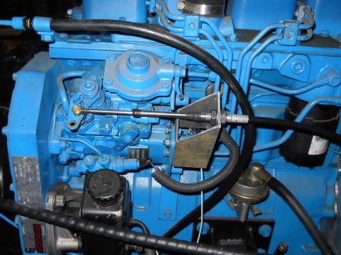 1992 Ford Bronco - Engine components and fuel lines are visible in this close-up view.