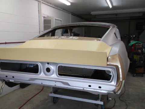 1967 Ford Mustang - This classic car is being restored, with the rear body panels prepped for paint.