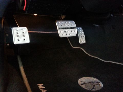 2003 Mercury Marauder - Aftermarket pedal covers are visible inside a vehicle, with the word 'Marauder' clearly marked on one of them.