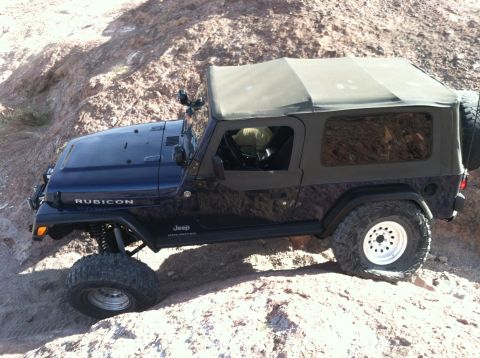 2005 Jeep Wrangler - This Jeep Wrangler Rubicon Unlimited is navigating a rocky, off-road trail.