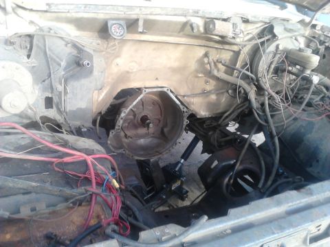 1988 Ford Bronco - DAY 2: Pulled the old seized motor out. Since the motor was seized, I couldn't get to the torque converter nuts and had to pull the torque…
