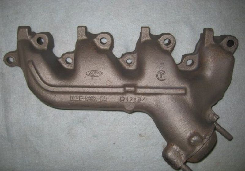 Ford exhaust manifold with part number 11ZE-9431-BA and date code 0197
