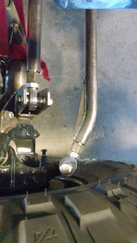 1985 Jeep CJ7 - This image shows a close-up view of a suspension component connected to a tire, likely for sale as a spare part.