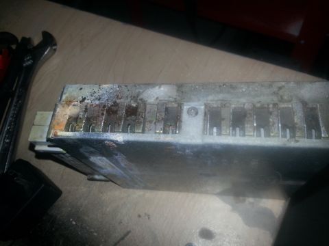 1994 Ford Bronco - This engine control module shows significant corrosion and damage to its connectors.