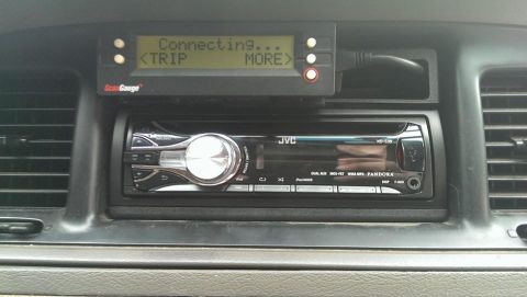 2000 Mercury Grand Marquis - Aftermarket JVC stereo and ScanGauge installed in a car's dashboard.