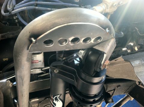 1977 Ford F-350 - Close-up of a custom suspension component, likely for an off-road vehicle.