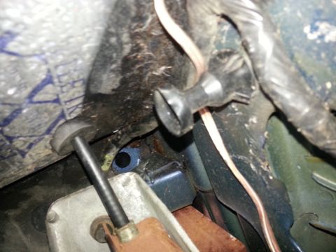 1994 Ford Bronco - Detail of wiring and mechanical components within a vehicle, not clearly identifiable.