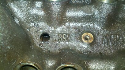 1989 Ford F-150 - A close-up view of an engine block shows cast numbers, possibly indicating engine displacement or a casting code.