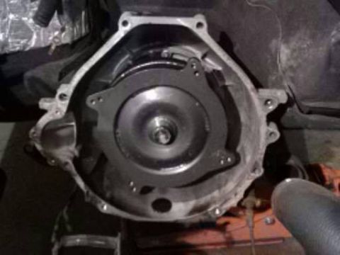 2004 Ford Crown Victoria - Close-up of a transmission bell housing, showing the torque converter.