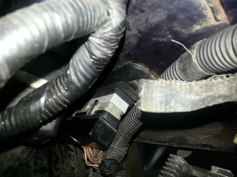 1994 Ford Bronco - Engine bay wiring harness and electrical connectors, likely part of an EEC system.