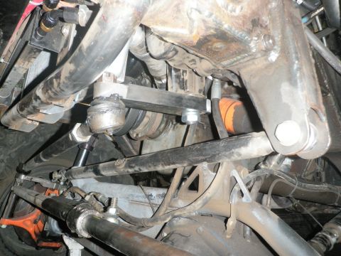 1961 International Scout 800 - Underside view of complex steering and suspension system components.