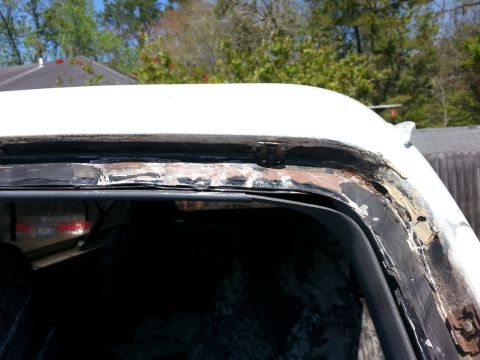 1992 Ford Bronco - you can see in the upper right hand corner what looks like rust. it's doubtful, but maybe the water was getting in through there.