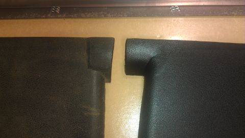 1973 Chevrolet Camaro - Interior view of a car's door panel, focusing on the window crank mechanism.
