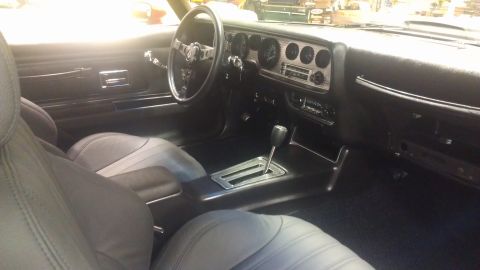 1972 Pontiac Trans Am - Interior view of a classic car, showing the dashboard and seating area.