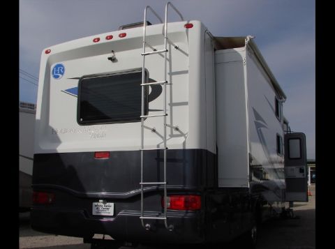 2010 Ford F-450 - This RV features a rear ladder and the "Holiday Rambler" branding is visible on the back.