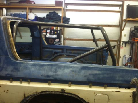 1979 Ford Bronco - This 1979 Ford Bronco is undergoing modifications in a garage setting.