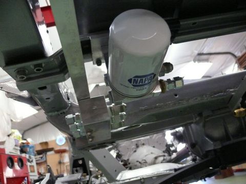 NAPA oil filter assembly mounted on vehicle frame