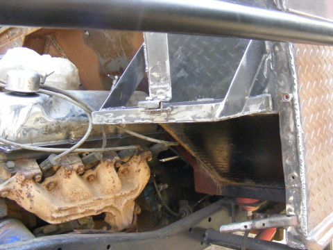 Engine block and exhaust manifold with custom metal fabrication and diamond plate