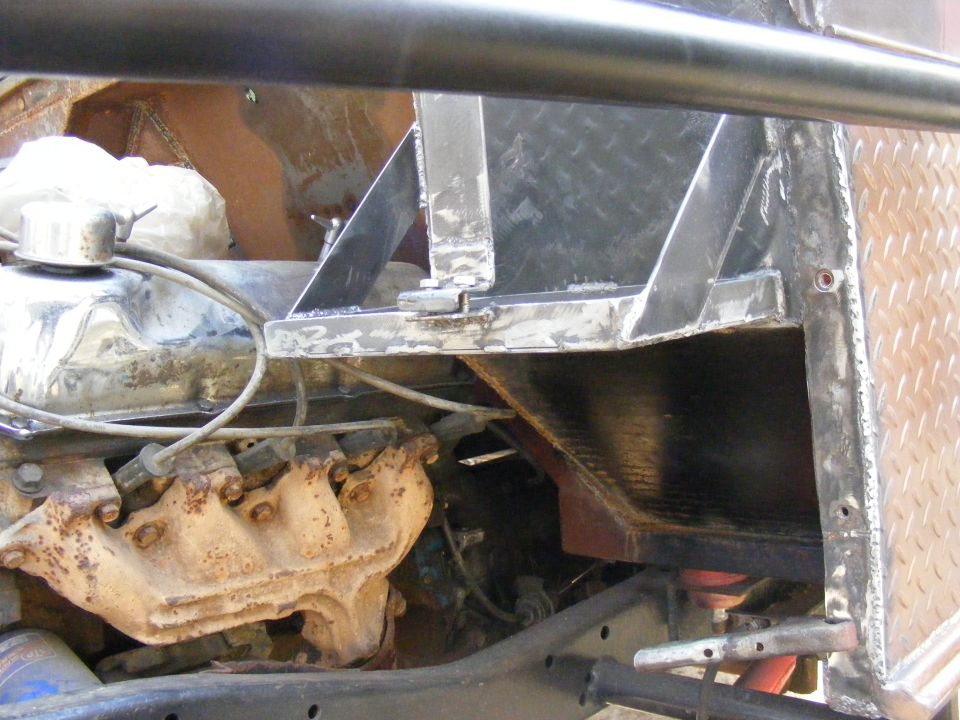 Engine block and exhaust manifold with custom metal fabrication and diamond plate