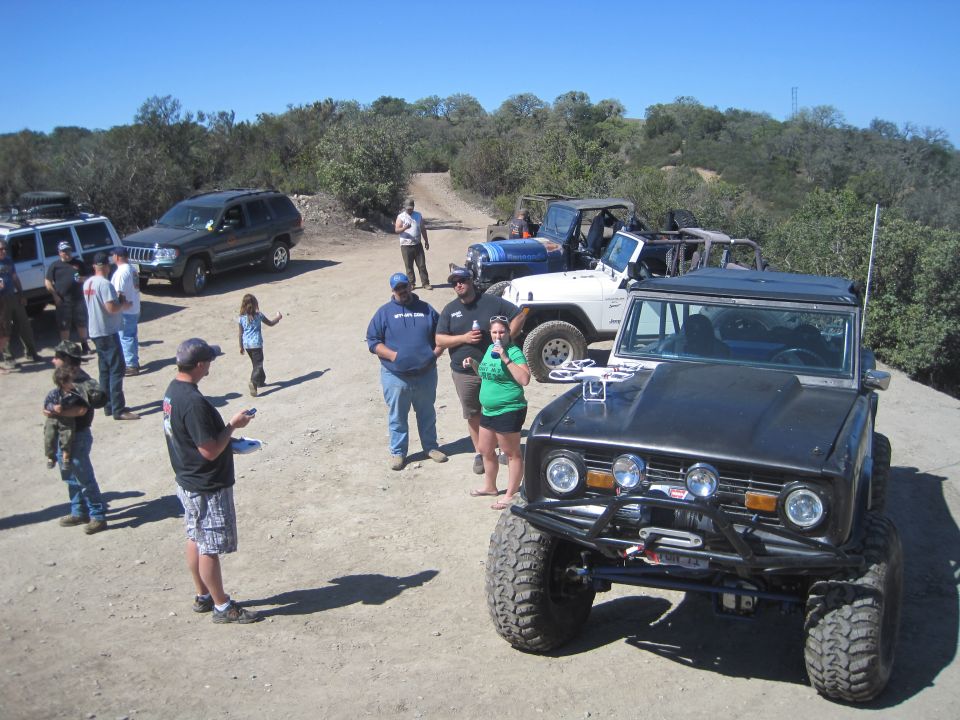 Black Ford Bronco with off-road modifications, front view