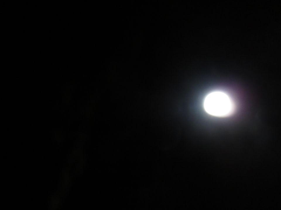 Bright light in dark scene
