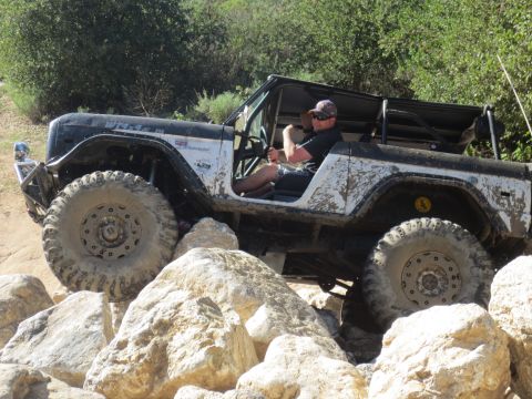 1989 Ford Bronco - This 1989 Ford Bronco is shown off-roading through a rocky trail.