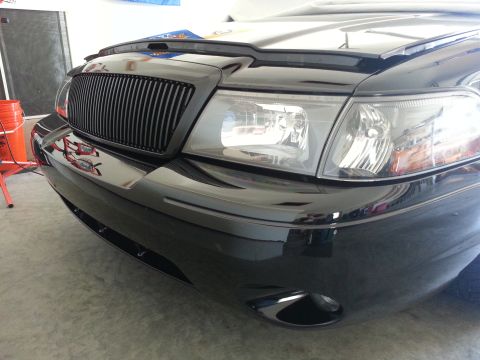 2003 Mercury Marauder - Front view of a black 2003 Mercury Marauder showing its distinctive grille and headlights.