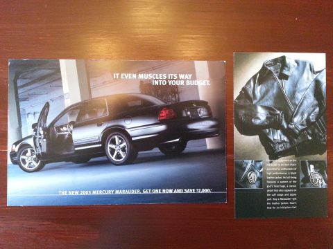 2003 Mercury Marauder - Promotional materials for a 2003 Mercury Marauder and a leather jacket are displayed side-by-side.