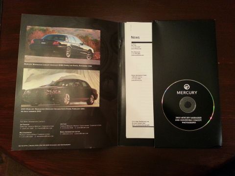 2003 Mercury Marauder - Promotional materials for the Mercury Marauder concept, including photos and a CD with photography.