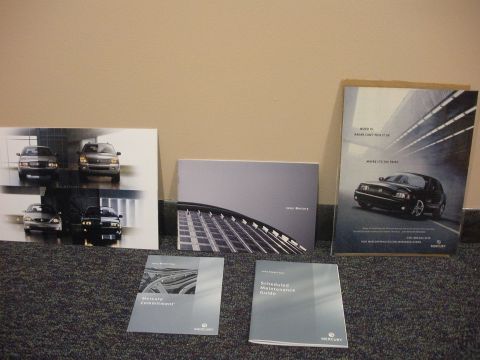 2003 Mercury Marauder - A collection of Mercury promotional materials, including brochures and photographs of various vehicles.