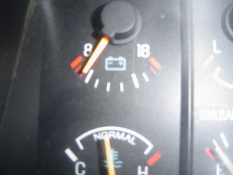 1989 Ford Bronco - This is my amp guage at night, stereo on, heat on, lights on, and fog lights on...steady, just real low