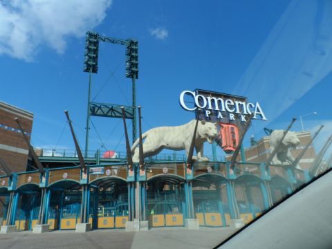 1971 Ford Ranchero - Comerica Park entrance features large tiger statues and stadium lighting on a clear day.