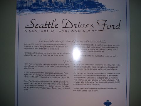 1999 Ford Crown Victoria - Historical document detailing Ford's impact on Seattle's automotive history and city development.