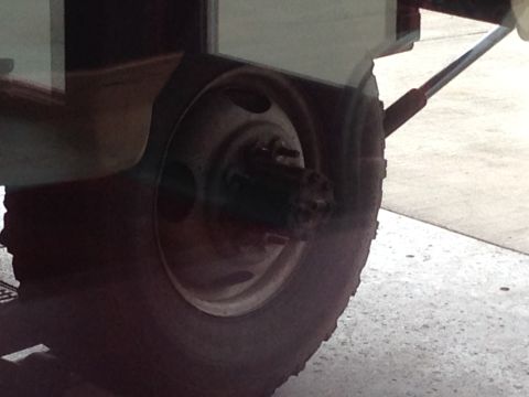 1988 Ford F-350 - Close-up view of a truck's rear dual wheel hub and tire.
