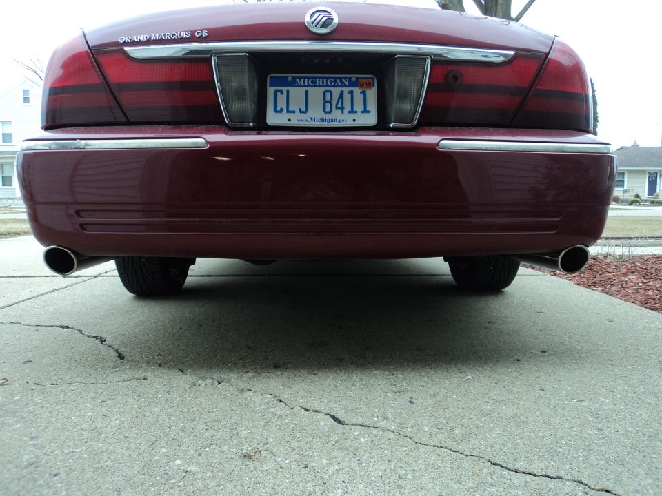 Red 2004 Mercury Grand Marquis rear with Michigan license plate CLJ 8411