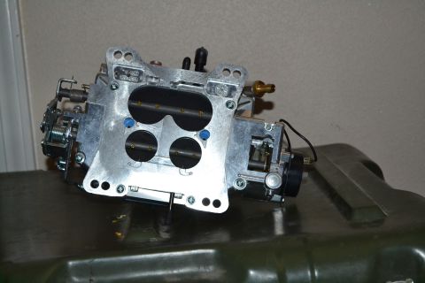 1981 Ford F-250 - A close-up view of a carburetor, a critical engine component for fuel delivery.