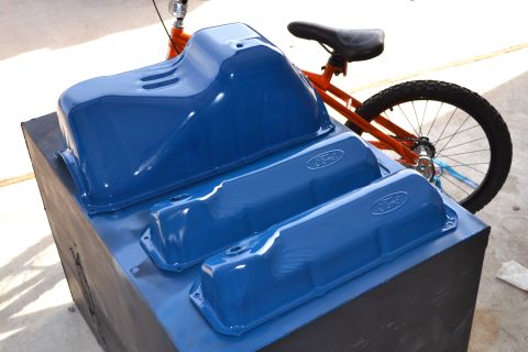 1981 Ford F-250 - Blue Ford valve covers and oil pan are displayed, with the Ford logo clearly visible on the valve covers.
